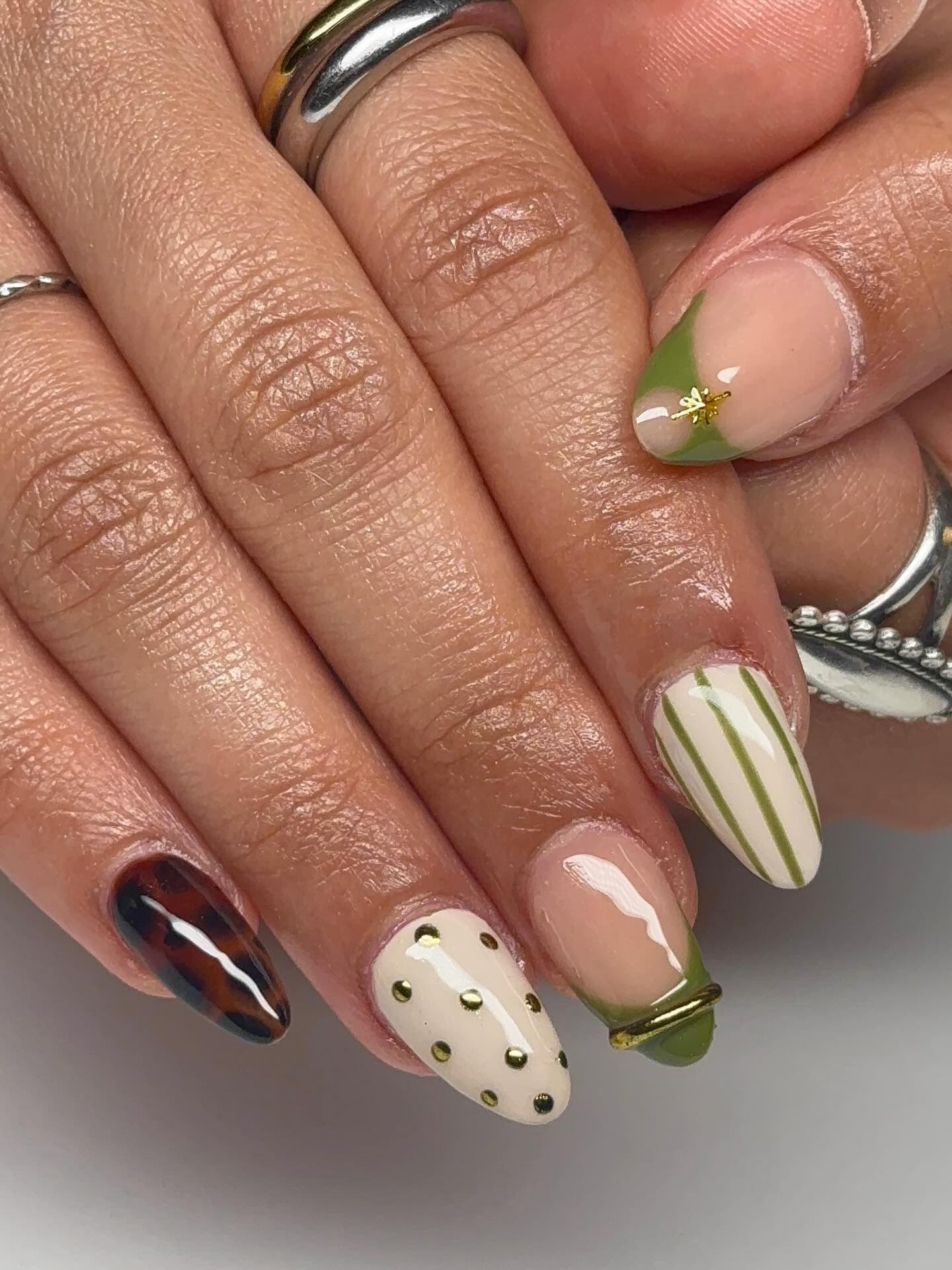 Mauve almond acrylics finished with hand-painted blossoms